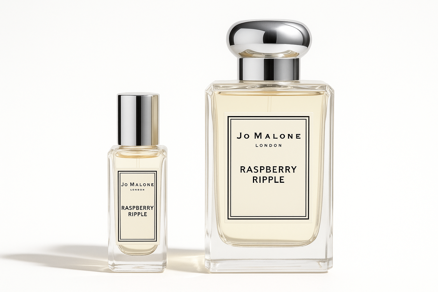Jo Malone Raspberry Ripple 12 ml-es mintás üveg a 100 ml-es Jo Malone Raspberry Ripple üveg mellett áll.